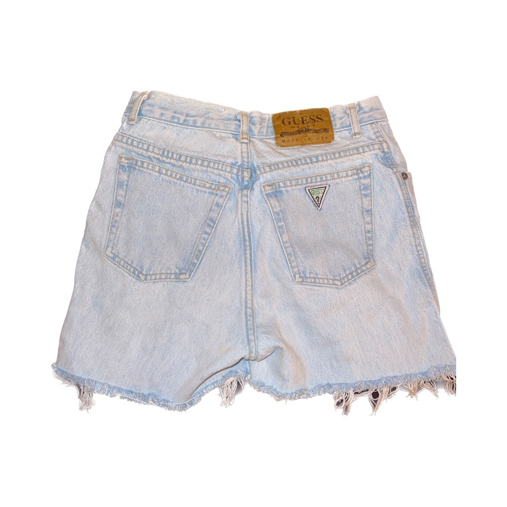 SOLDLight blue vintage 90s guess cut off jean shorts